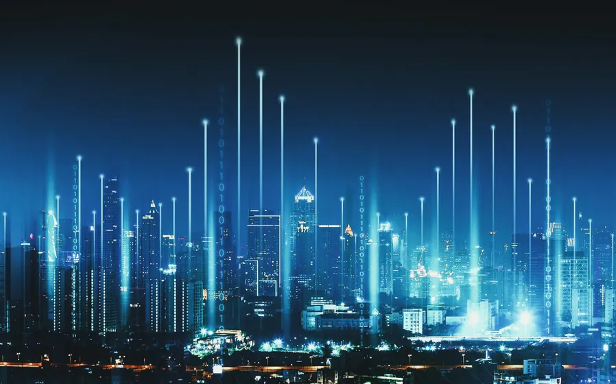 Nighttime skyline with blue neon lines floating in the sky as a smart network with connection technology.